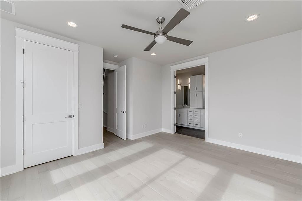 5002 Pecan Springs Road, Unit 10 Austin, TX 78723 - Photo 11 of 29 Unfurnished bedroom with visible vents, recessed lighting, and baseboards