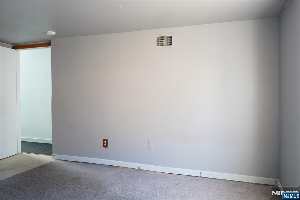 83 Roosevelt Avenue Butler, NJ 07405 - Photo 14 of 32 a view of an empty room