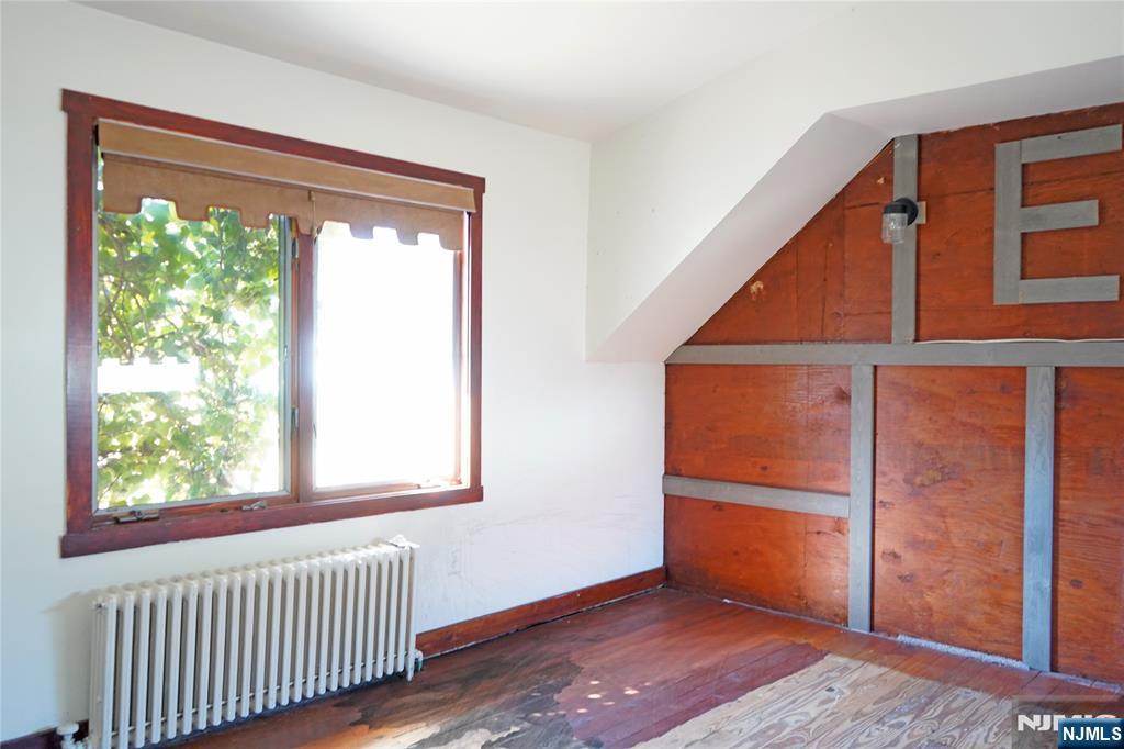 83 Roosevelt Avenue Butler, NJ 07405 - Photo 25 of 32 an empty room with windows