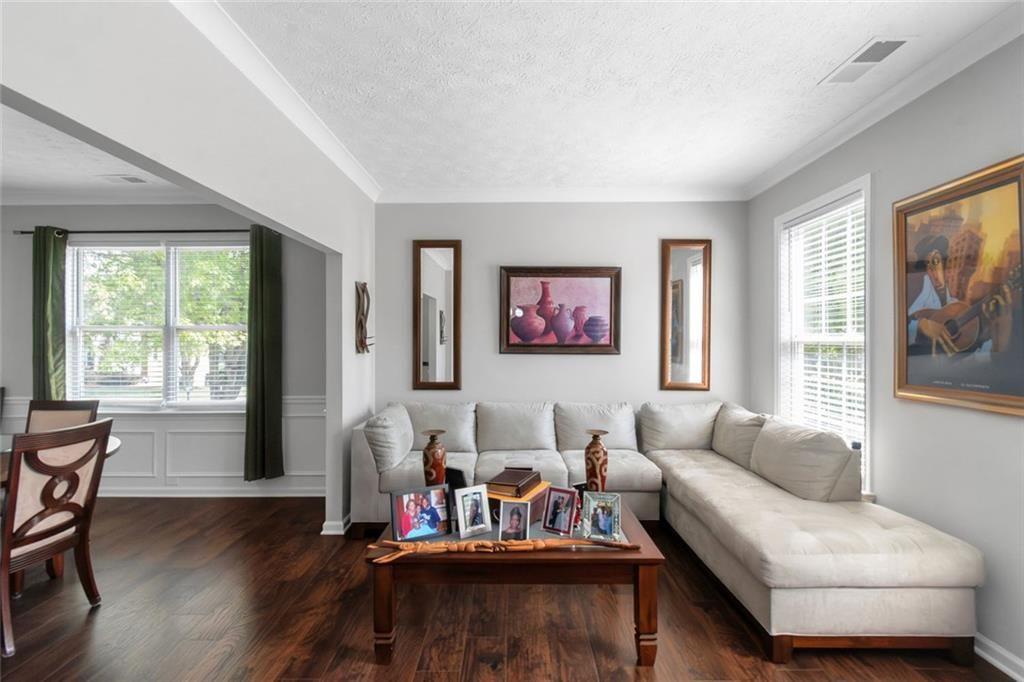 3152 Spruce Way Atlanta, GA 30349 - Photo 21 of 42 a living room with furniture and a large window