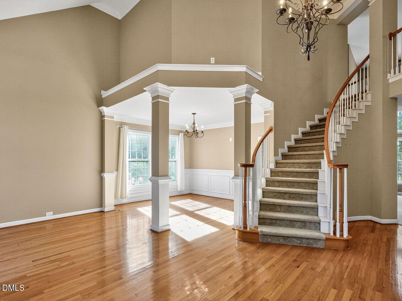 101 Fringe Tree Court Cary, NC 27519 - Photo 8 of 40 Grand Staircase and Dining Room