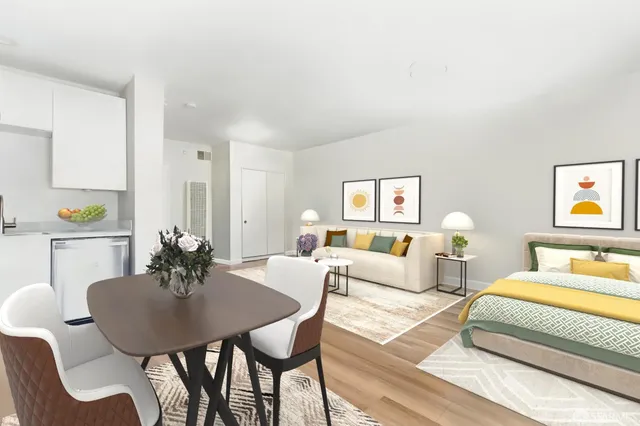 a living room with furniture and a table