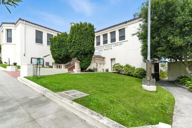 a view of a lake with a yard