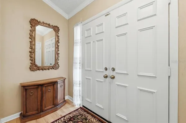 a bathroom with a mirror and a shower