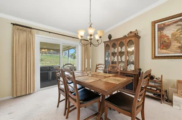 a kitchen with stainless steel appliances granite countertop a refrigerator and a stove