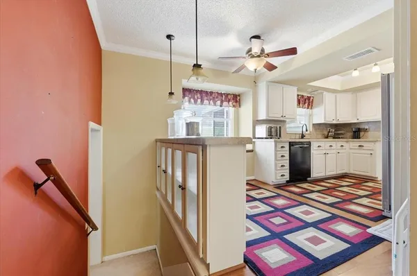 a spacious bedroom with a bed and a couch