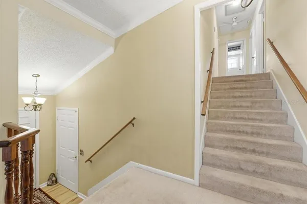 a bedroom with furniture and window