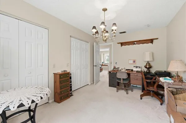 a kitchen with a sink a stove and a window
