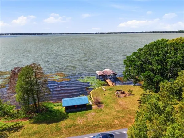 a view of a lake from a balcony
