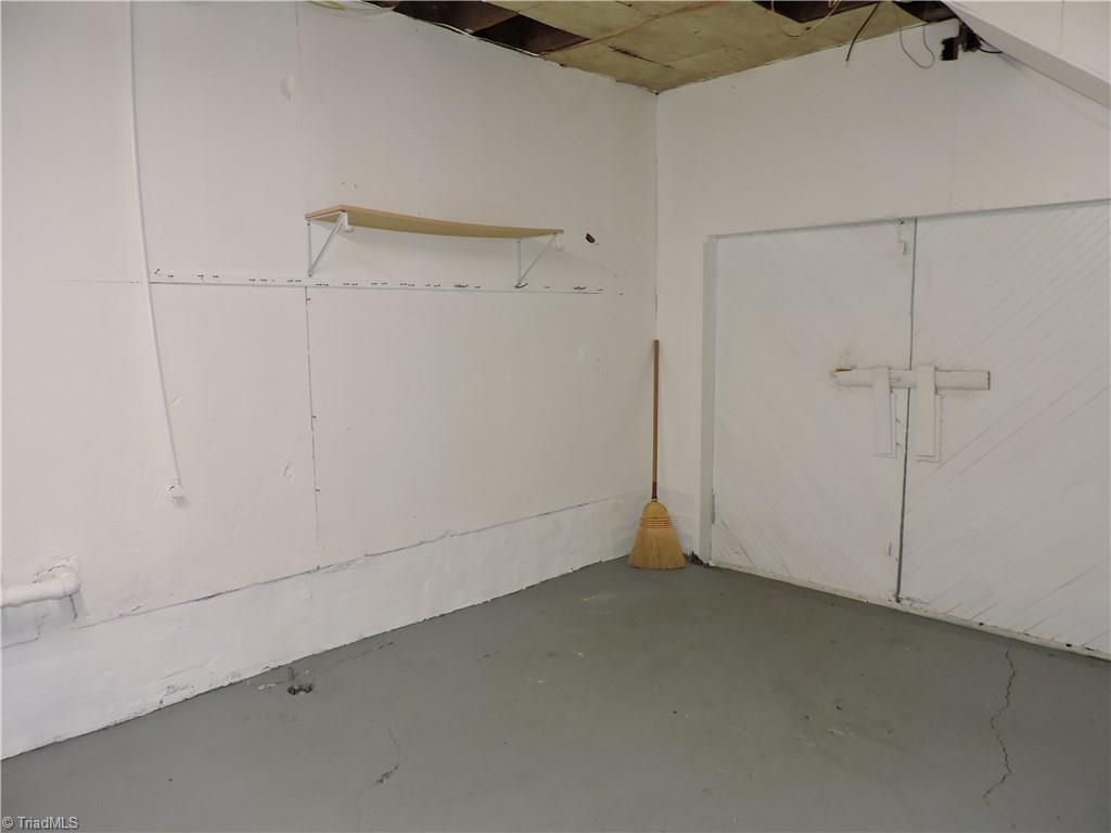 127 Country Club Road Mount Airy, NC 27030 - Photo 29 of 30 Workshop in basement with access to exterior
