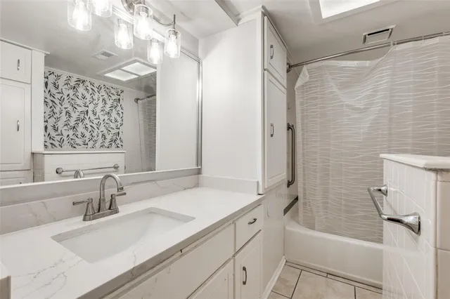 a bathroom with a sink and a tub