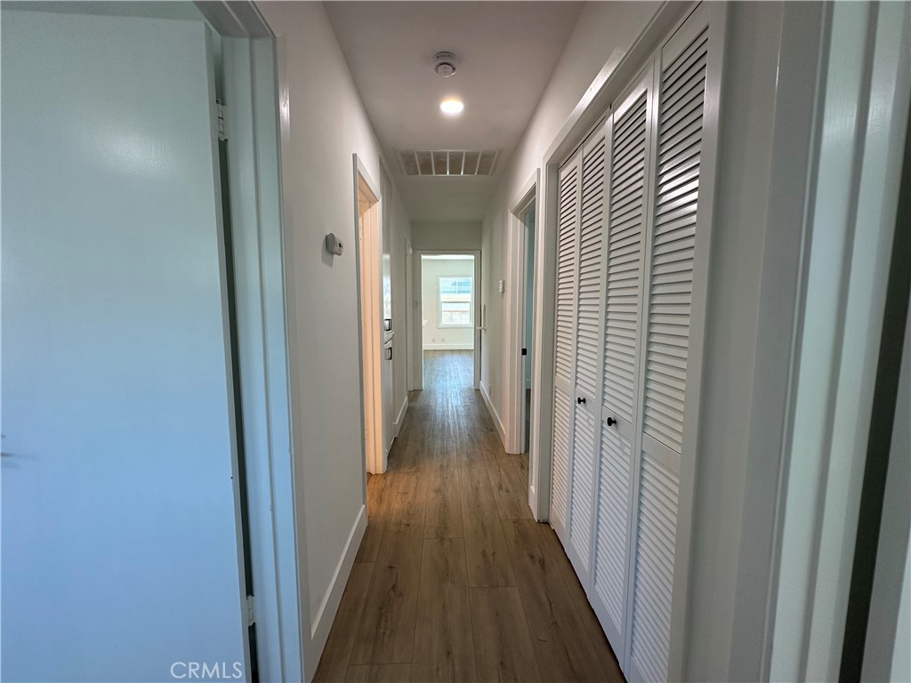 4561 Cover Street Riverside, CA 92506 - Photo 37 of 47 a view of hallway with wooden floor