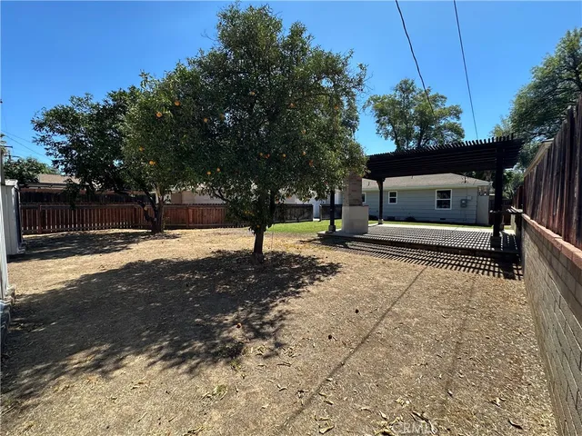 a house with trees in front of it