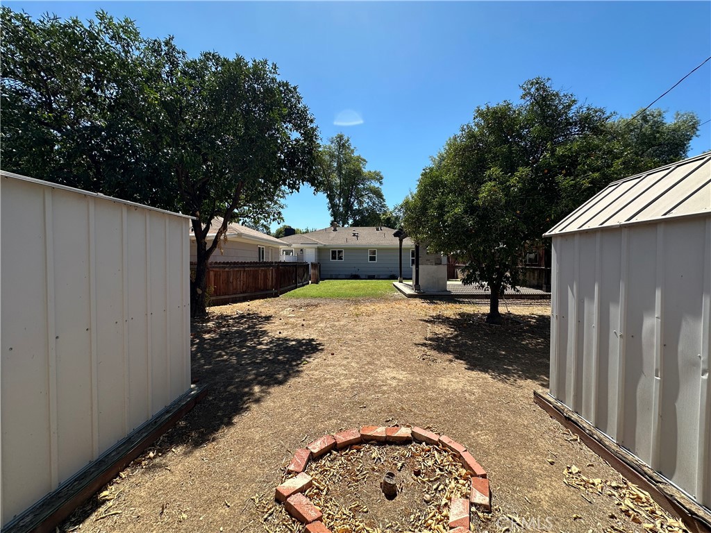 4561 Cover Street Riverside, CA 92506 - Photo 45 of 47 a view of a backyard with a sink and a tree