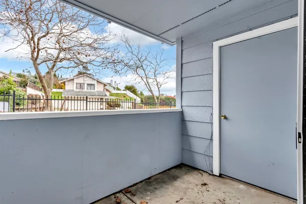 a view of a cars park in front of house