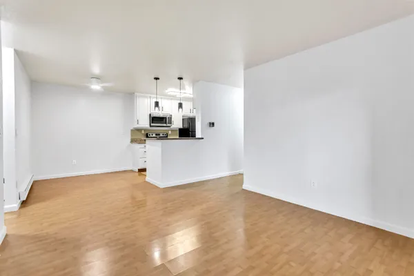 a view of a kitchen with a sink