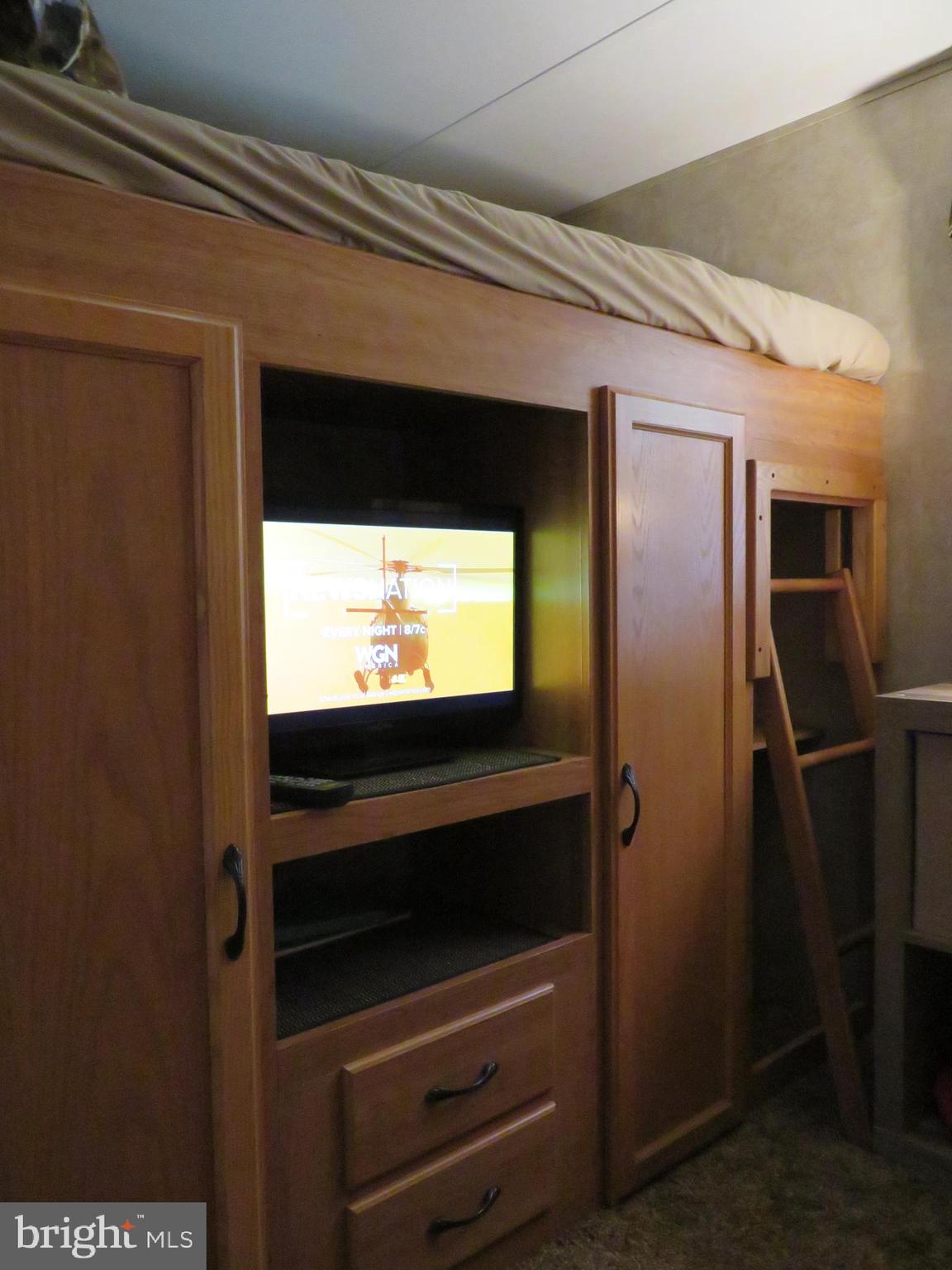 79-6 & 79-7 Detour Road Falling Waters, WV 25419 - Photo 22 of 29 Bunk House TV and Storage