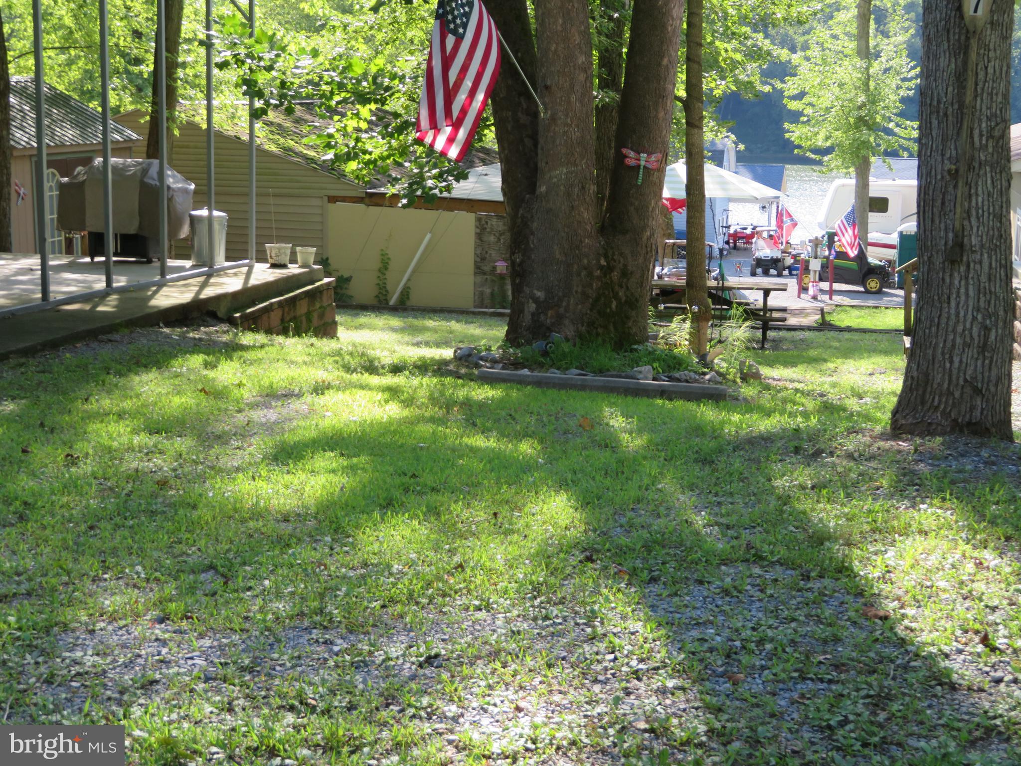 79-6 & 79-7 Detour Road Falling Waters, WV 25419 - Photo 6 of 29 Yard Area With Water View