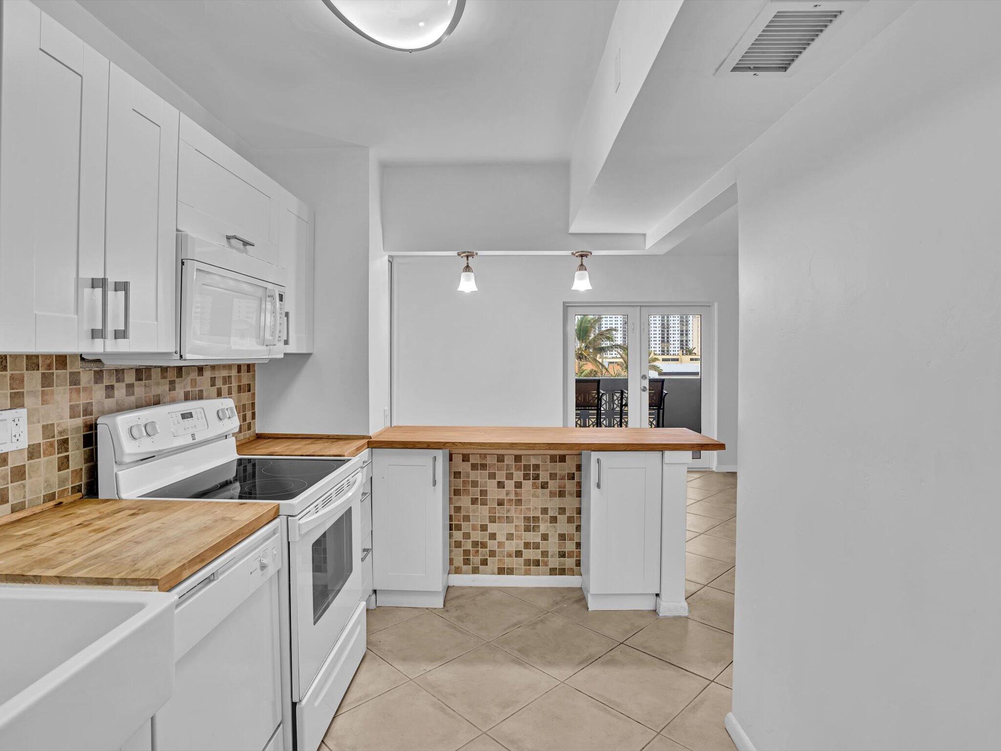 320 South Surf Road, Unit 402 Hollywood, FL 33019 - Photo 7 of 30 Baker 402 kitchen to use first