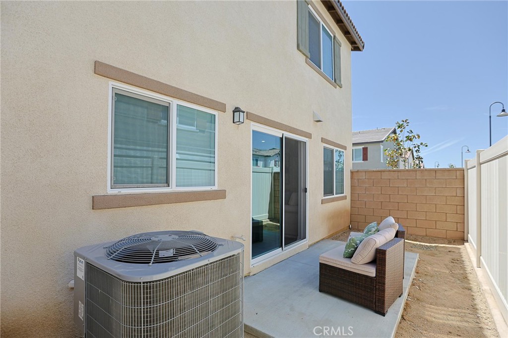 7486 Olive Grv Street Riverside, CA 92507 - Photo 51 of 57 a kitchen with a stove and a sink