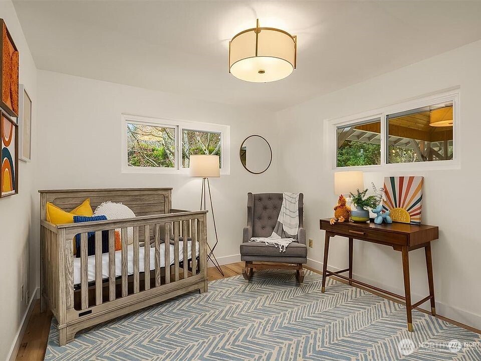 405 240th Street Southwest Bothell, WA 98021 - Photo 11 of 29 a bedroom with furniture and a window