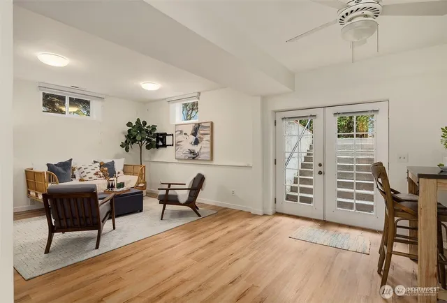 a view of a livingroom with furniture and wooden floor