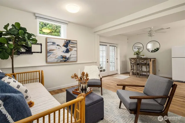 a dining room with furniture and window