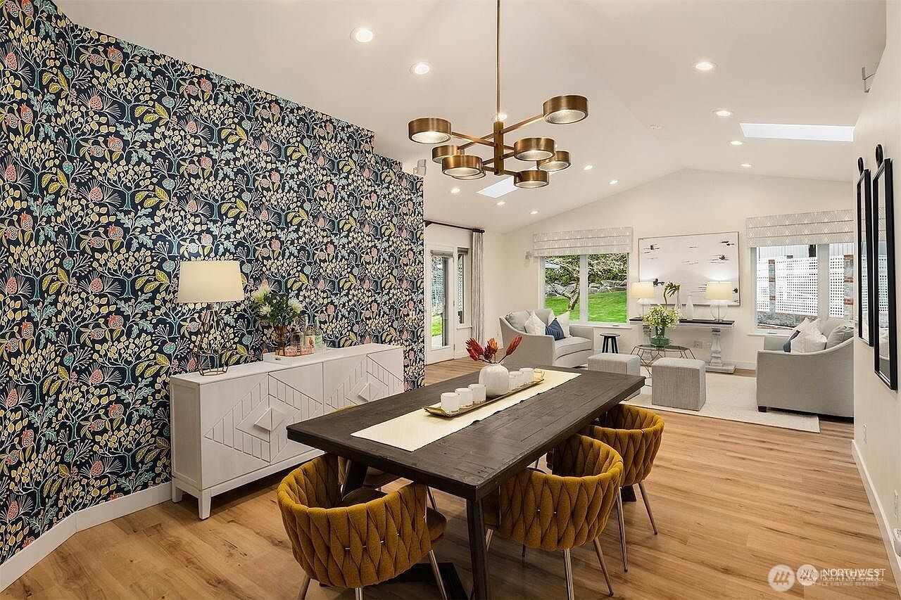 405 240th Street Southwest Bothell, WA 98021 - Photo 3 of 29 a view of a dining room with furniture and wooden floor