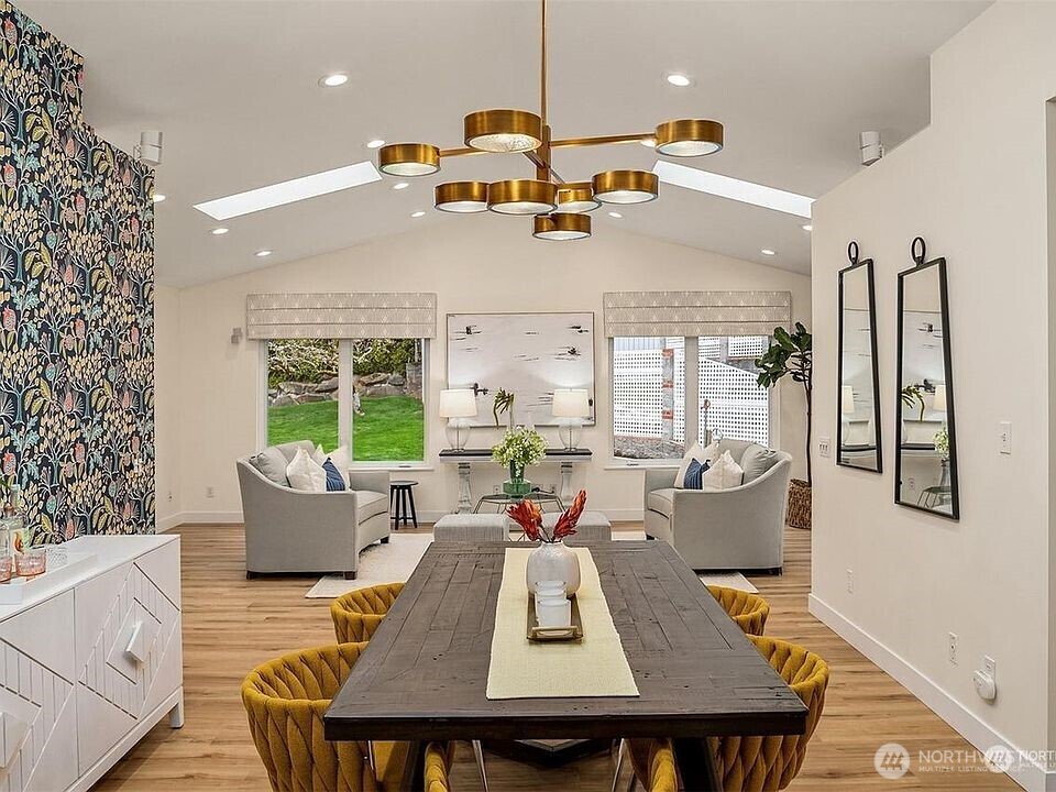 405 240th Street Southwest Bothell, WA 98021 - Photo 4 of 29 a view of a dining room with furniture window and outside view