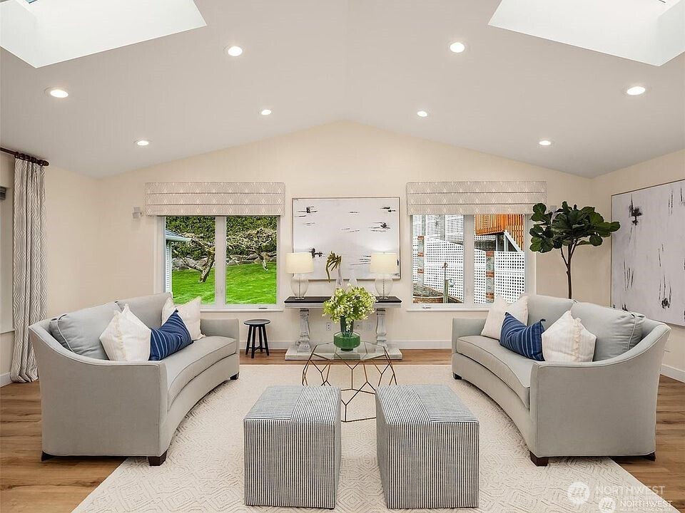 405 240th Street Southwest Bothell, WA 98021 - Photo 5 of 29 a living room with furniture and a large window