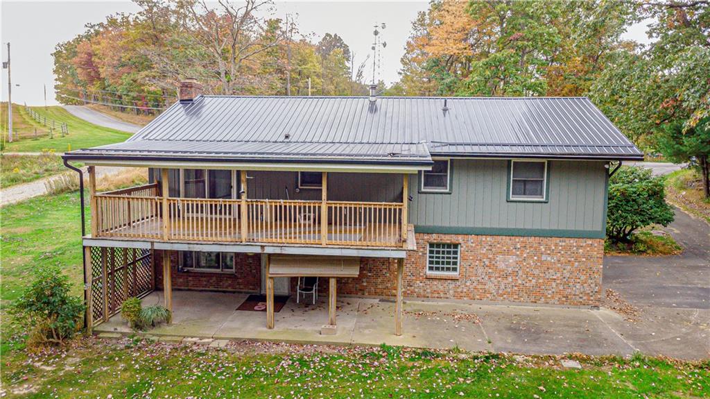 3794 Chestnut Ridge Road Blairsville, PA 15717 - Photo 5 of 26 a small house with a outdoor space