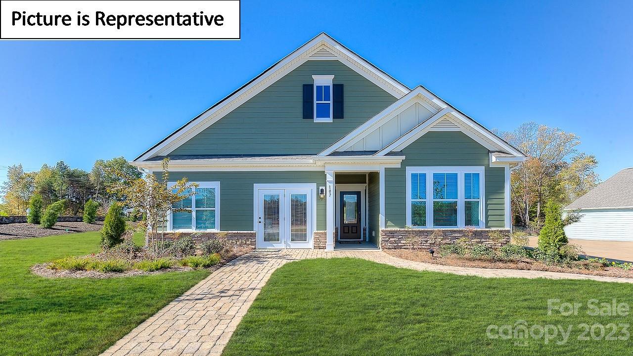 4249 Millstream Road Denver, NC 28037 - Photo 1 of 34 a front view of a house with a yard