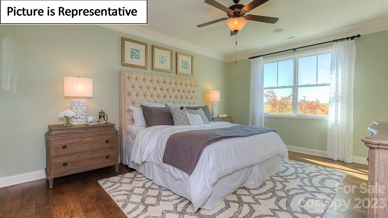 4249 Millstream Road Denver, NC 28037 - Photo 28 of 34 a bedroom with a bed and a window