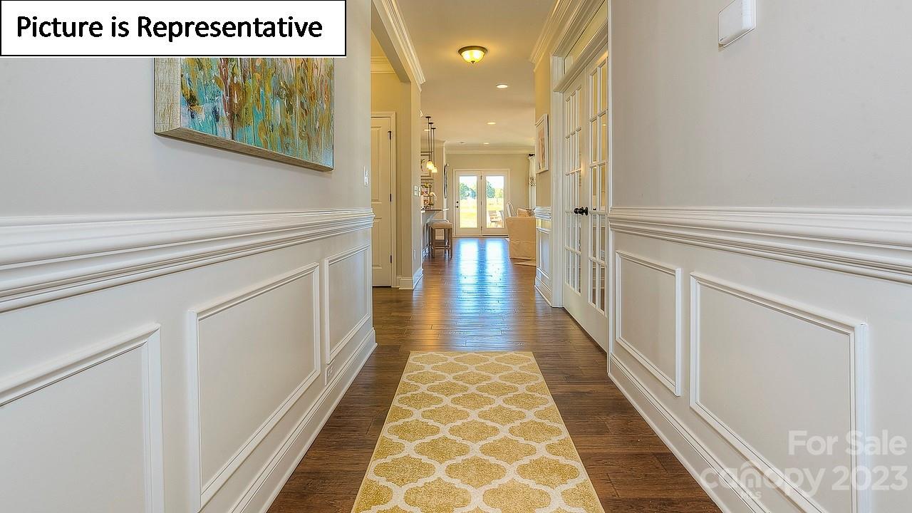 4249 Millstream Road Denver, NC 28037 - Photo 3 of 34 a hallway with wooden floor