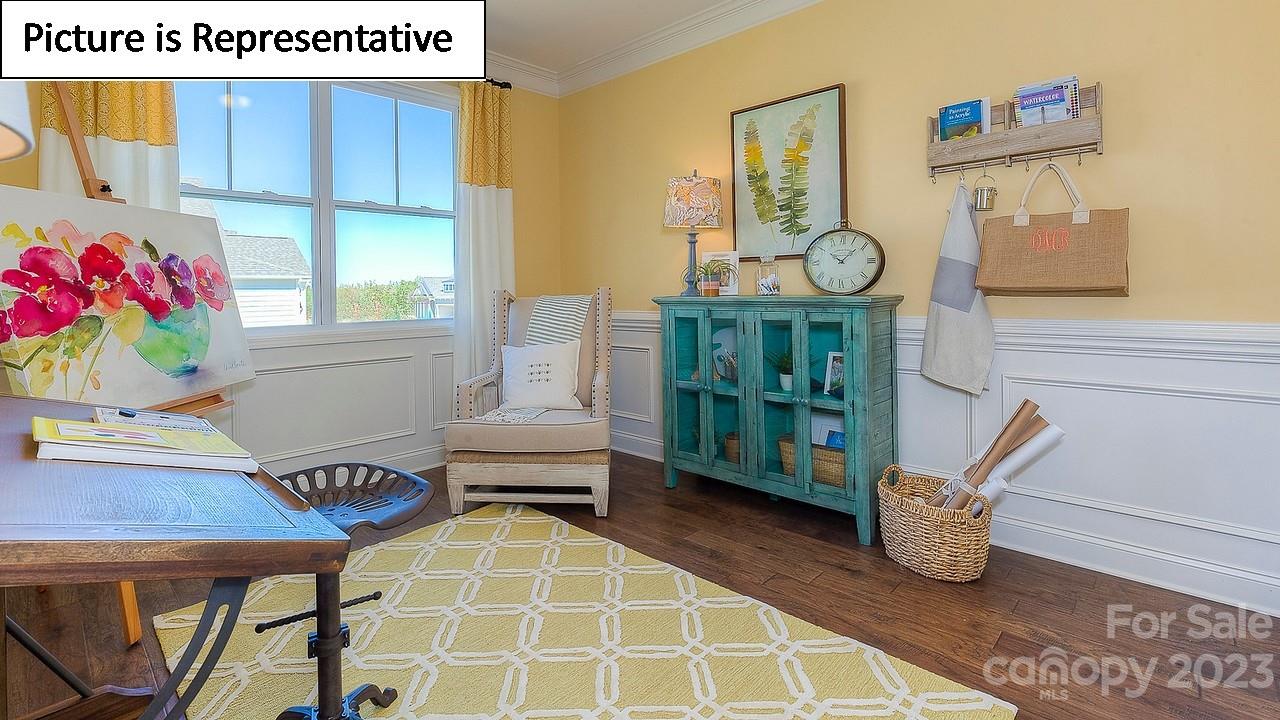 4249 Millstream Road Denver, NC 28037 - Photo 4 of 34 a living room with furniture and a table