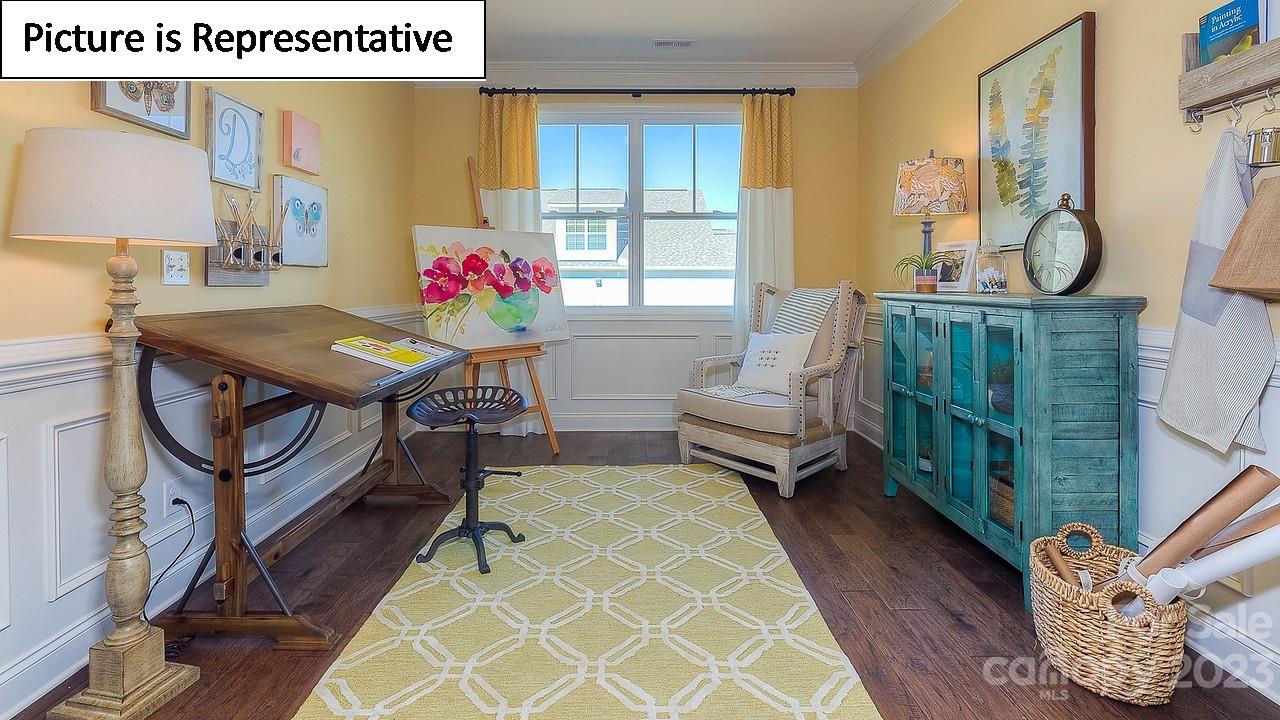 4249 Millstream Road Denver, NC 28037 - Photo 5 of 34 a living room with furniture and a potted plant