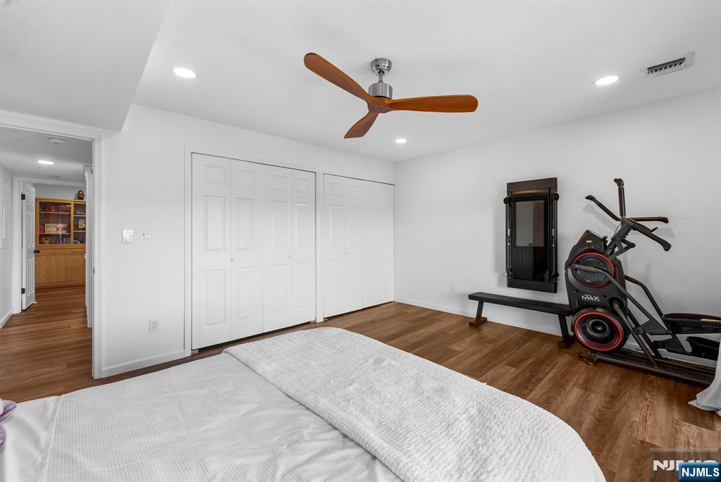 101 Highway 5, Unit 206 Edgewater, NJ 07020 - Photo 24 of 48 a bedroom with a bed and a view of bathroom