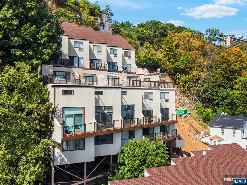 101 Highway 5, Unit 206 Edgewater, NJ 07020 - Photo 45 of 48 aerial view of a house with roof deck front of house