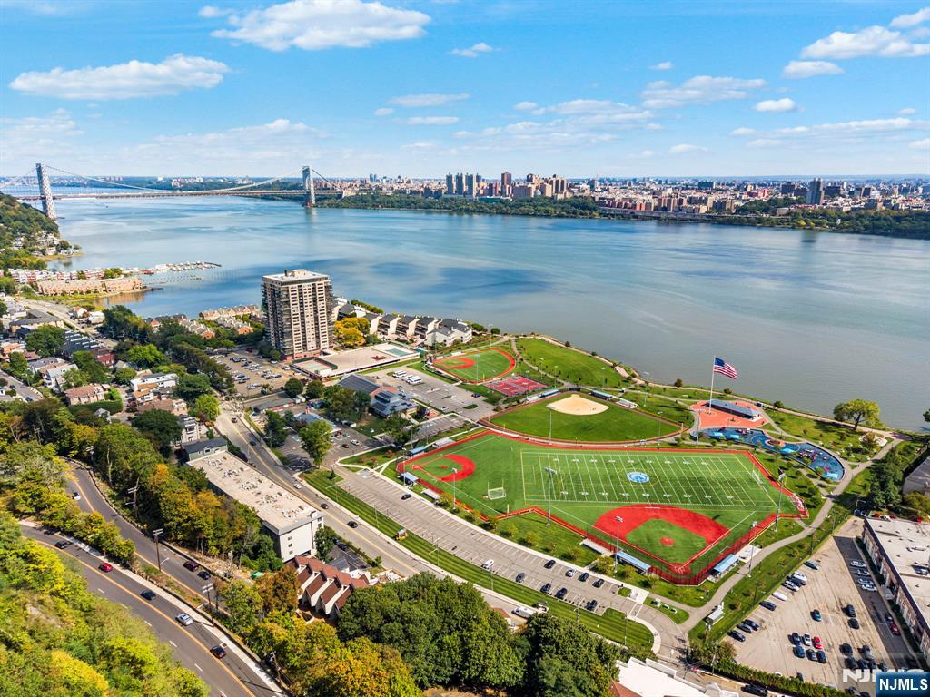 101 Highway 5, Unit 206 Edgewater, NJ 07020 - Photo 48 of 48 an aerial view of a house with a lake view