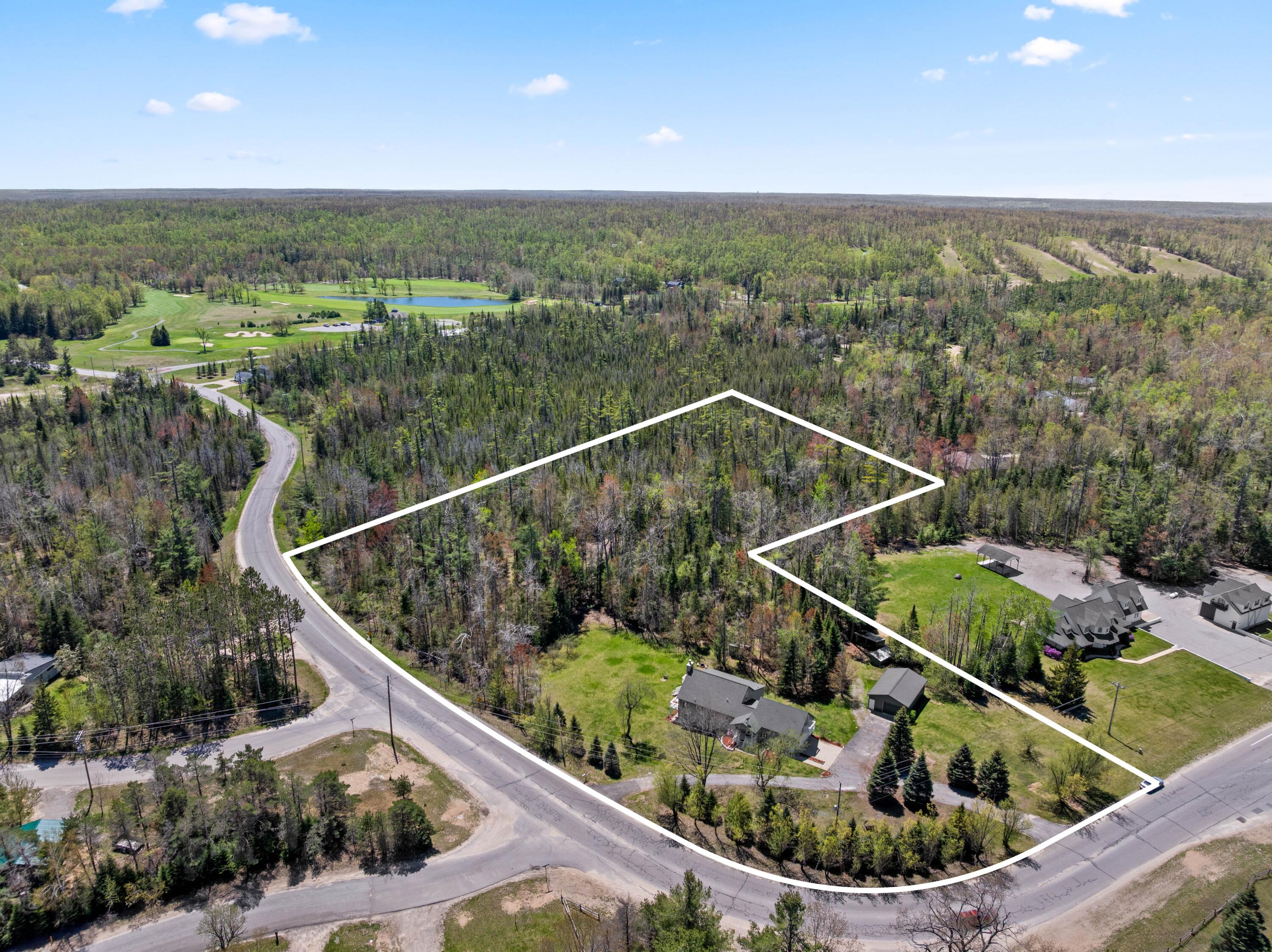 1011 Opal Lake Road Gaylord, MI 49735 - Photo 6 of 84 DJI_20260520141902_0036_D