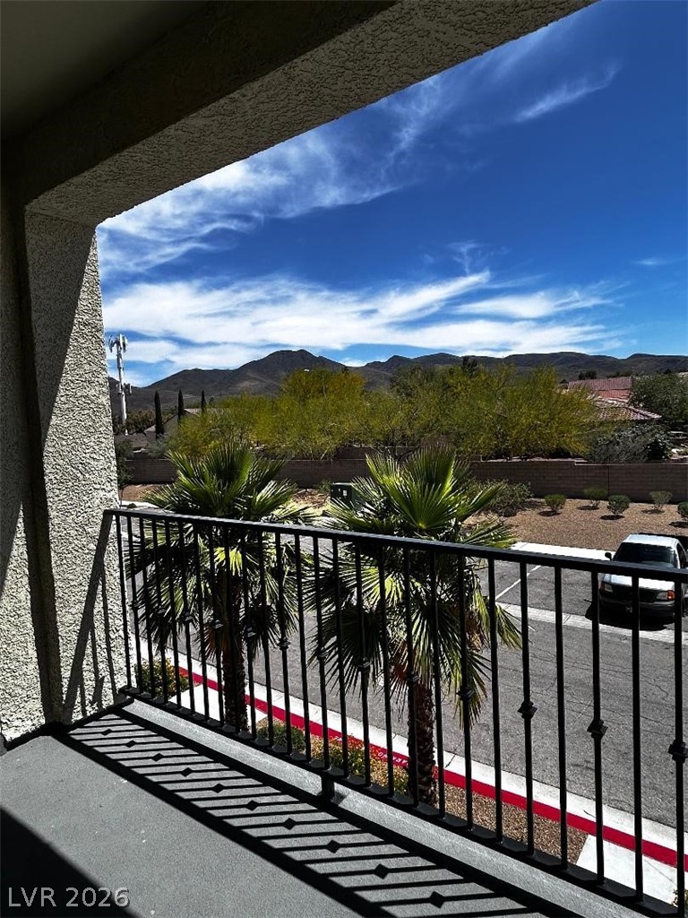2555 Hampton Road, Unit 8206 Henderson, NV 89052 - Photo 27 of 35 This outdoor space offers expansive views of distant mountains and lush greenery.