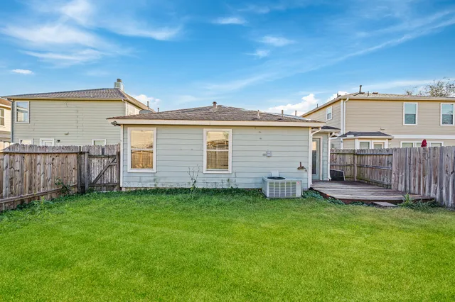 a view of a backyard with a garden