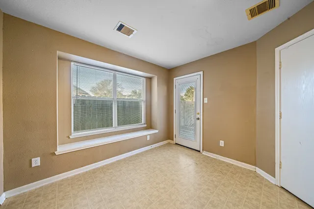 an empty room with a window