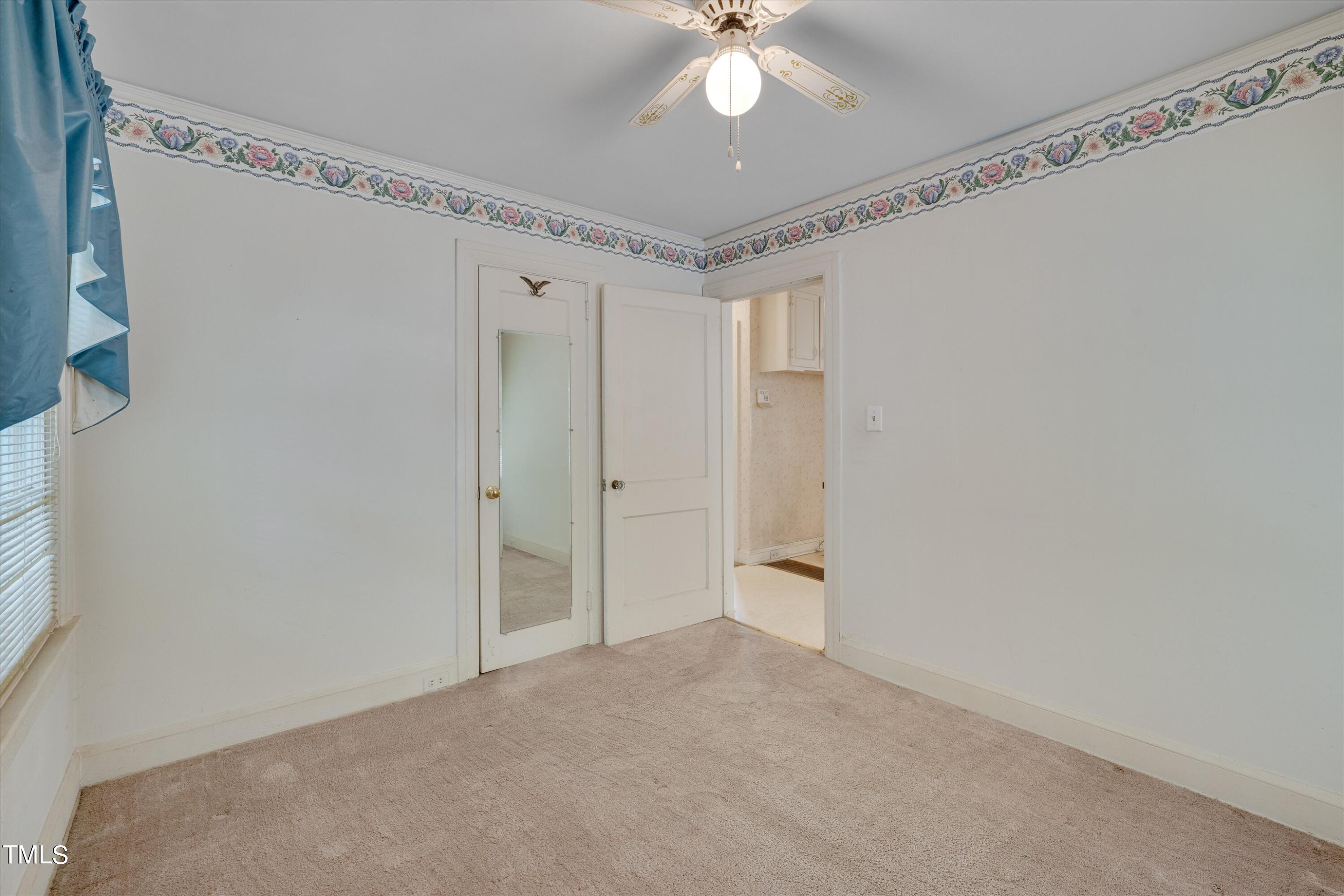 2421 Farthing Street Durham, NC 27704 - Photo 15 of 31 a view of a chandelier fan and entryway