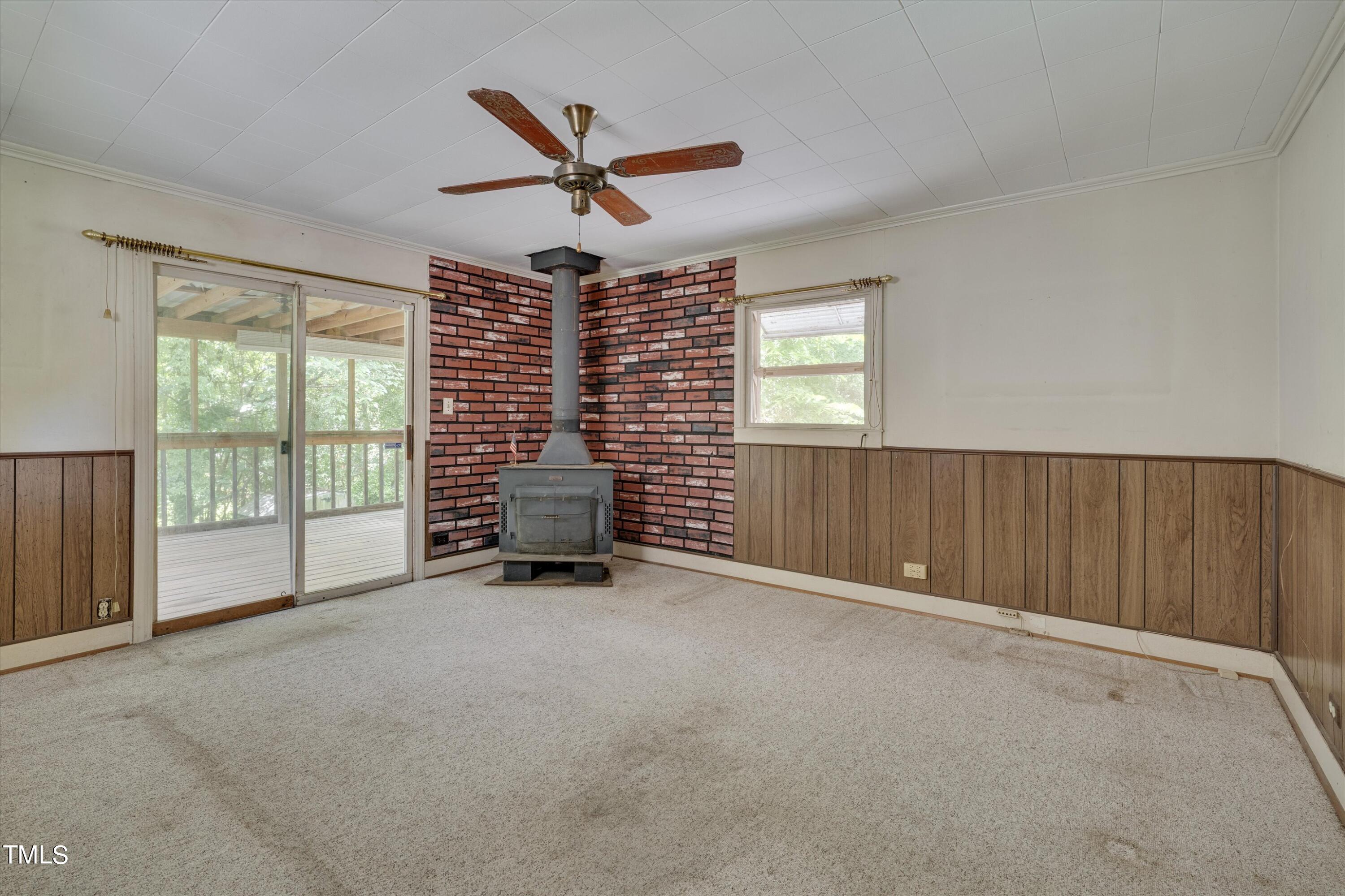 2421 Farthing Street Durham, NC 27704 - Photo 21 of 31 a view of an empty room with a window