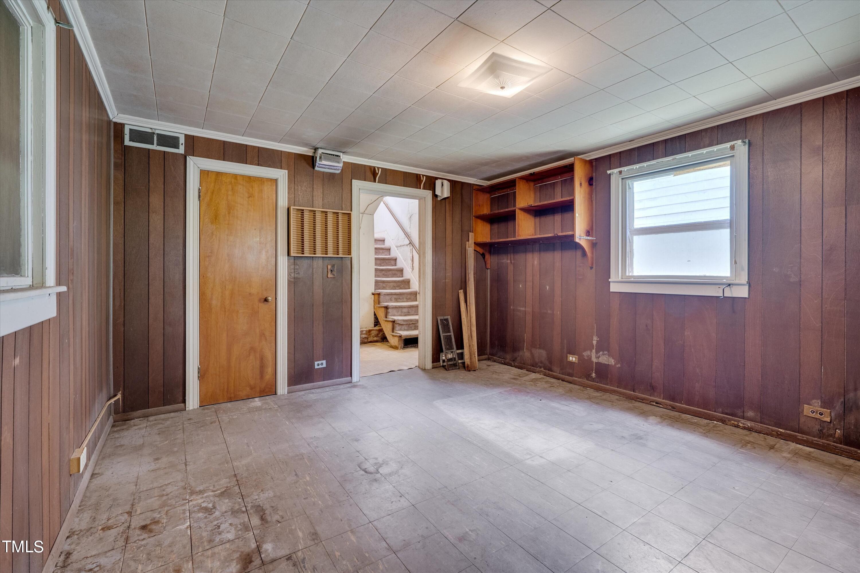 2421 Farthing Street Durham, NC 27704 - Photo 25 of 31 an empty room with closet and windows