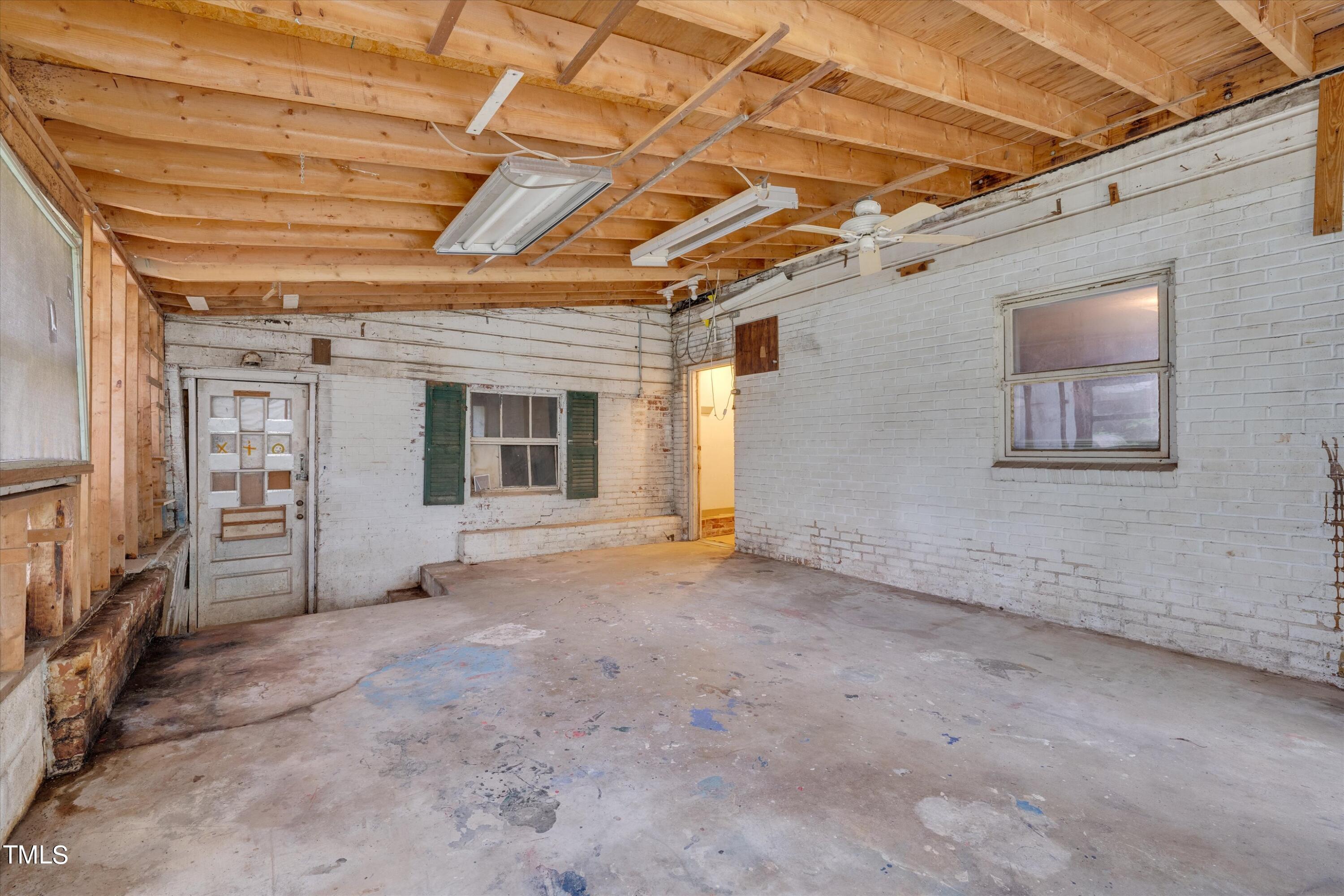 2421 Farthing Street Durham, NC 27704 - Photo 27 of 31 a view of an empty room with a window