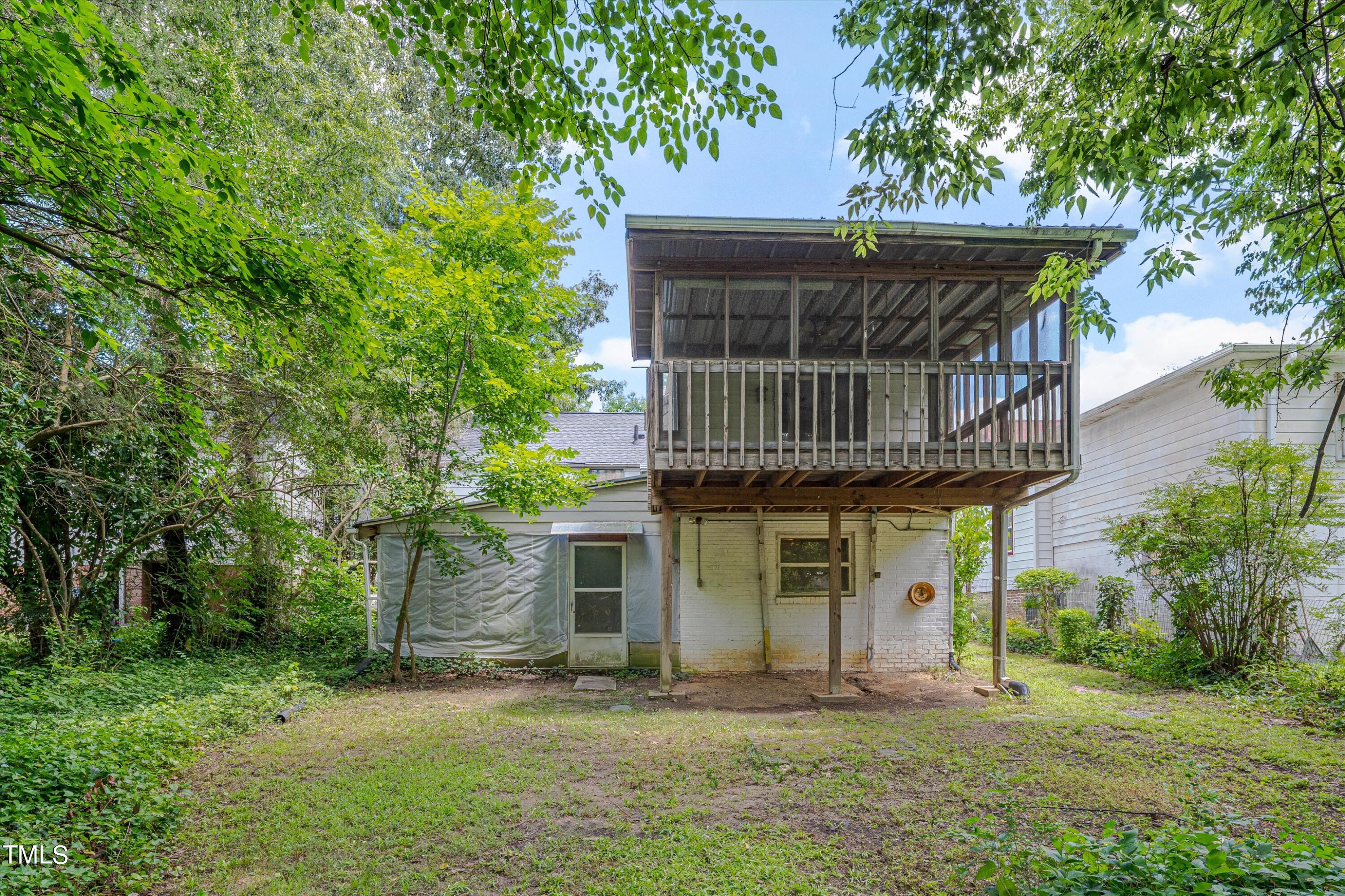 2421 Farthing Street Durham, NC 27704 - Photo 30 of 31 a view of a house with a yard