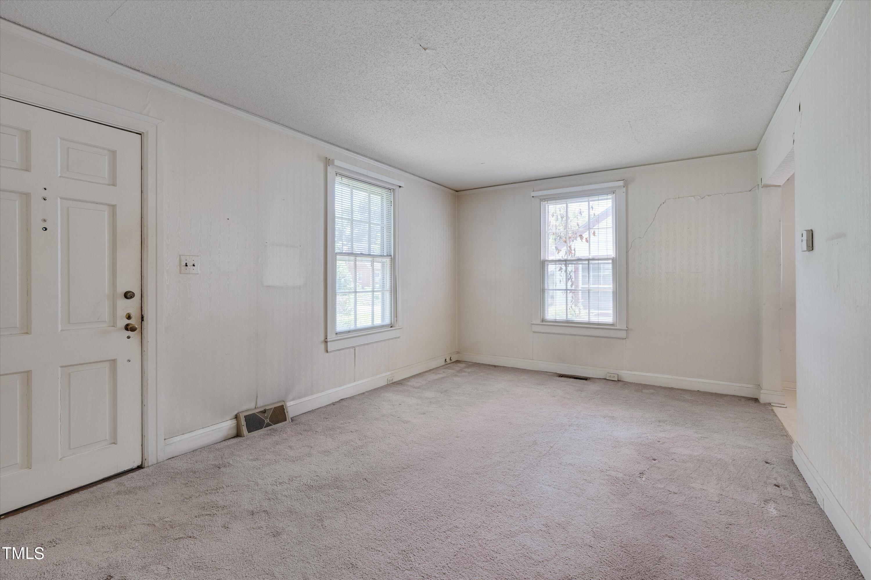 2421 Farthing Street Durham, NC 27704 - Photo 3 of 31 an empty room with windows