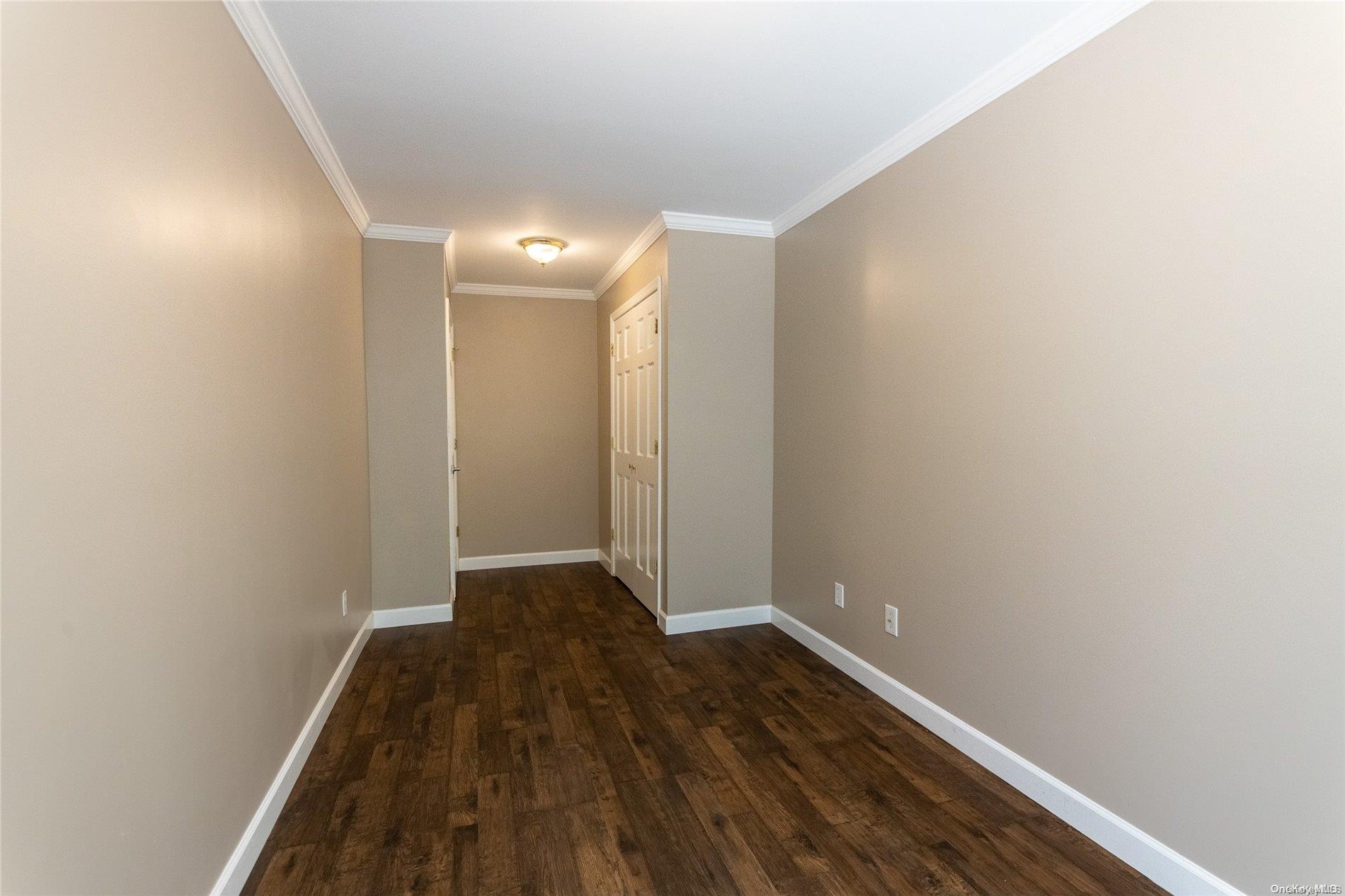 334 Lincoln Road Brooklyn, NY 11225 - Photo 2 of 11 a view of hallway with wooden floor